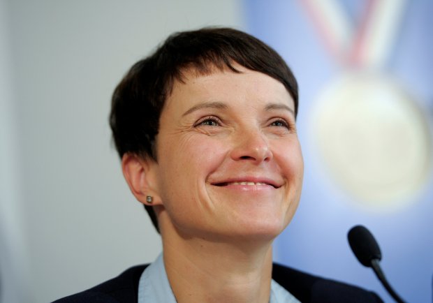 Frauke Petry, chairwoman of the anti-immigration party Alternative for Germany smiles at a news conference in Berlin
